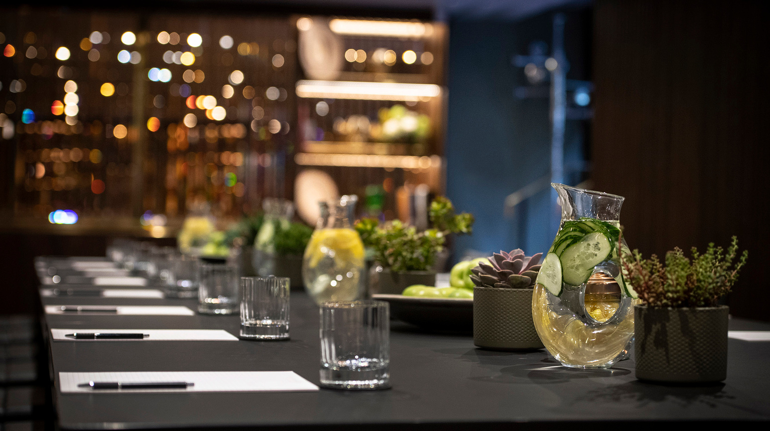 Meeting setup at The Library in Marylebone with sleek table and infused water.