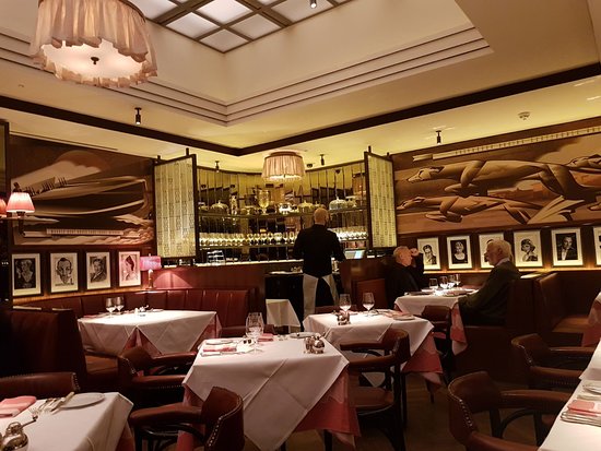 Elegant restaurant setting at The Colony Grill Room, perfect for upscale events and meetings.