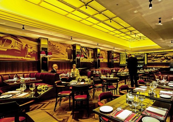 Stylish restaurant interior with warm lighting, ideal for upscale events and meetings.