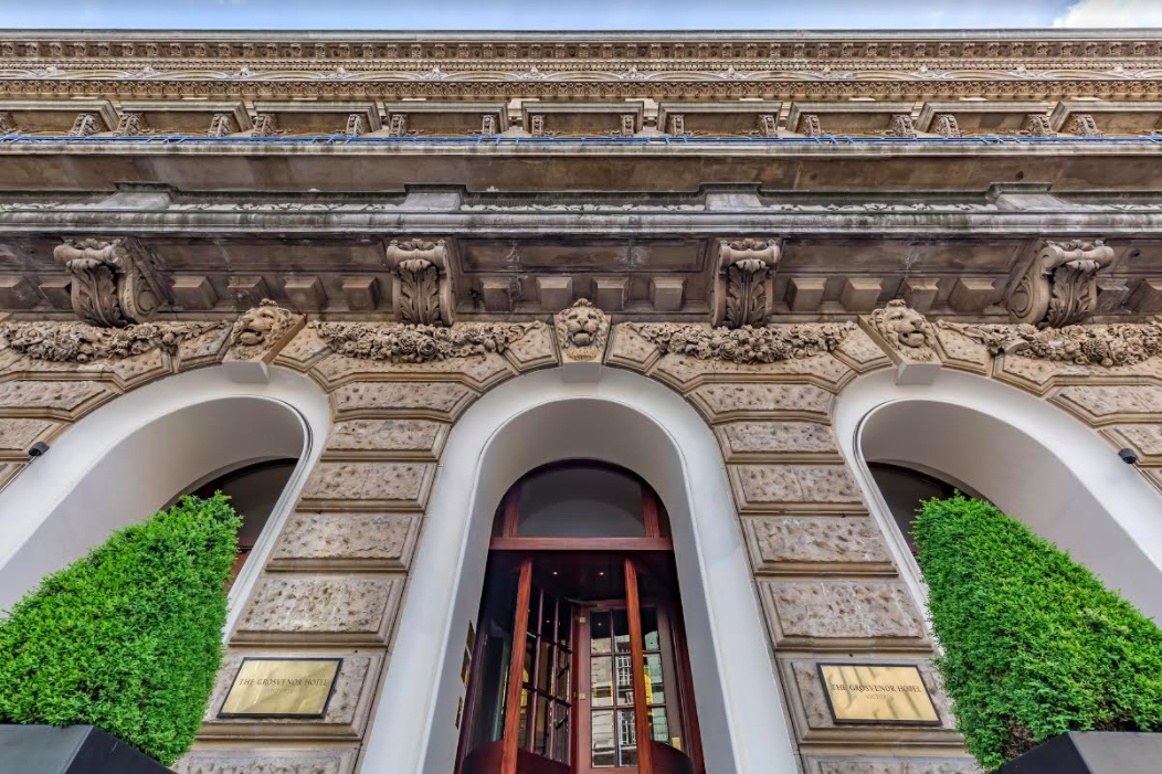 The Blue Boardroom entrance, elegant arches, ideal for upscale meetings and events.