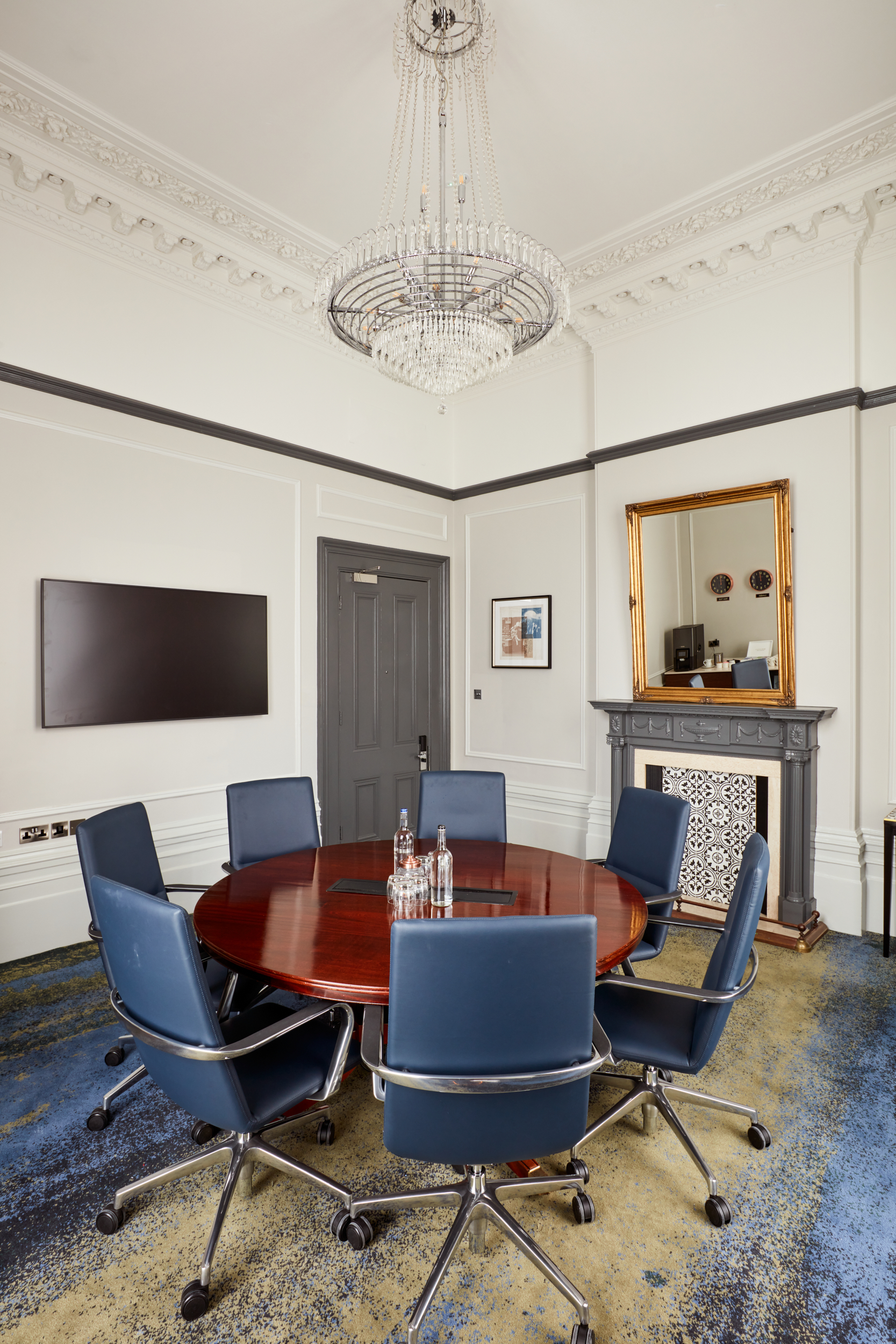 Venetian Meeting Room at Clermont Victoria with round table for professional gatherings.