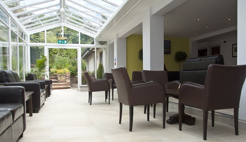 Milan Suite at Regency Park Hotel: modern meeting space with natural light for networking events.