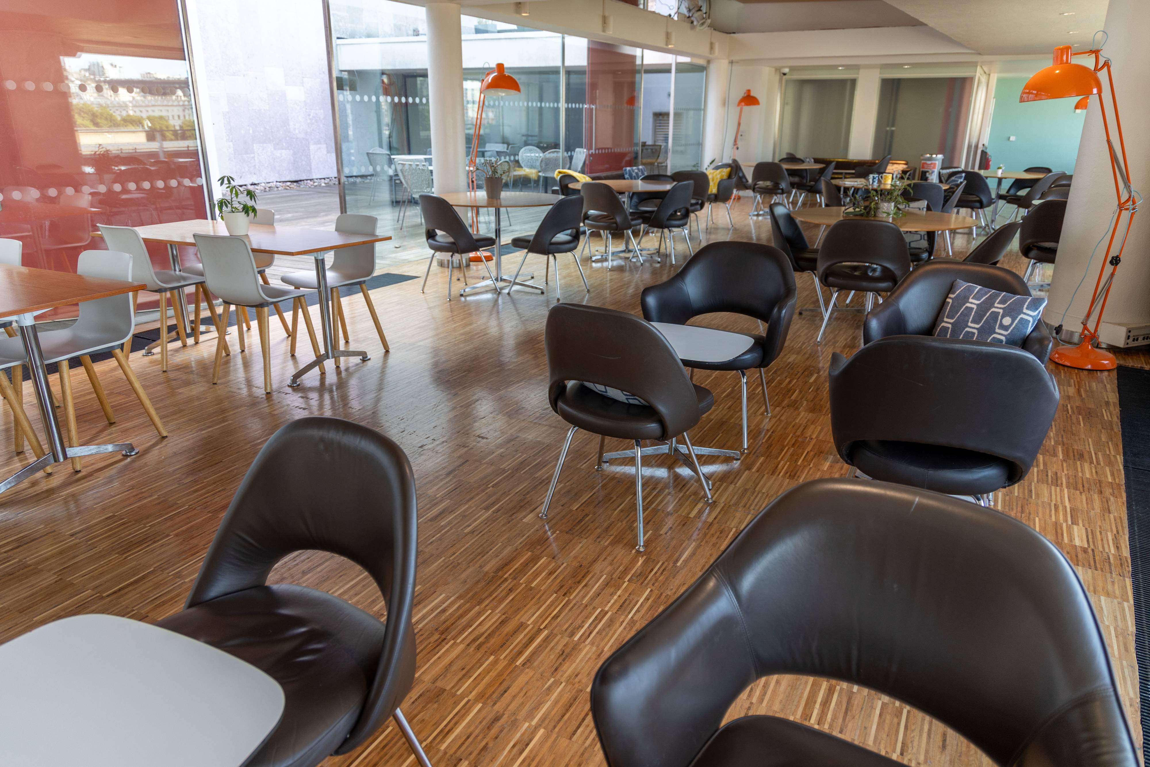 St Paul's Roof Pavilion: modern meeting space with sleek chairs, ideal for events and gatherings.