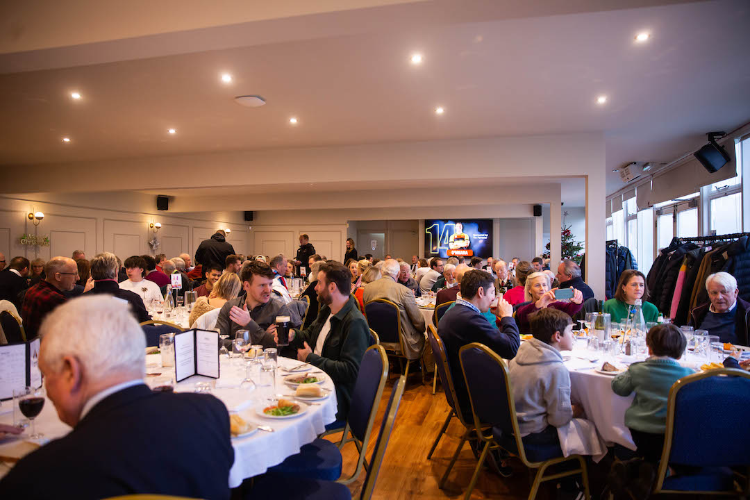 Club Room at Richmond Athletic Ground, bustling event space for networking and dining.