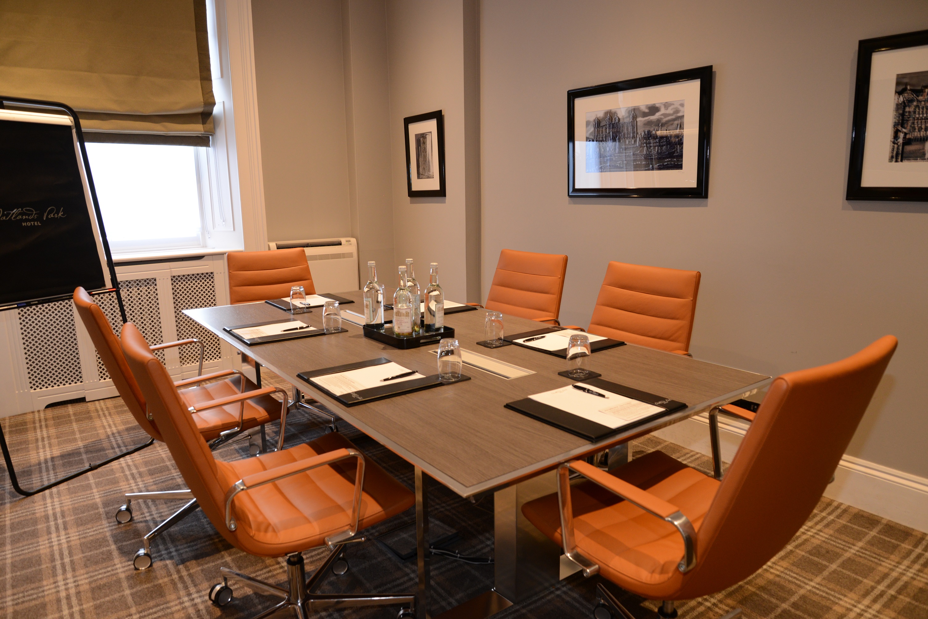 Howard Room at Oatlands Park Hotel, modern meeting space with natural light and comfort.