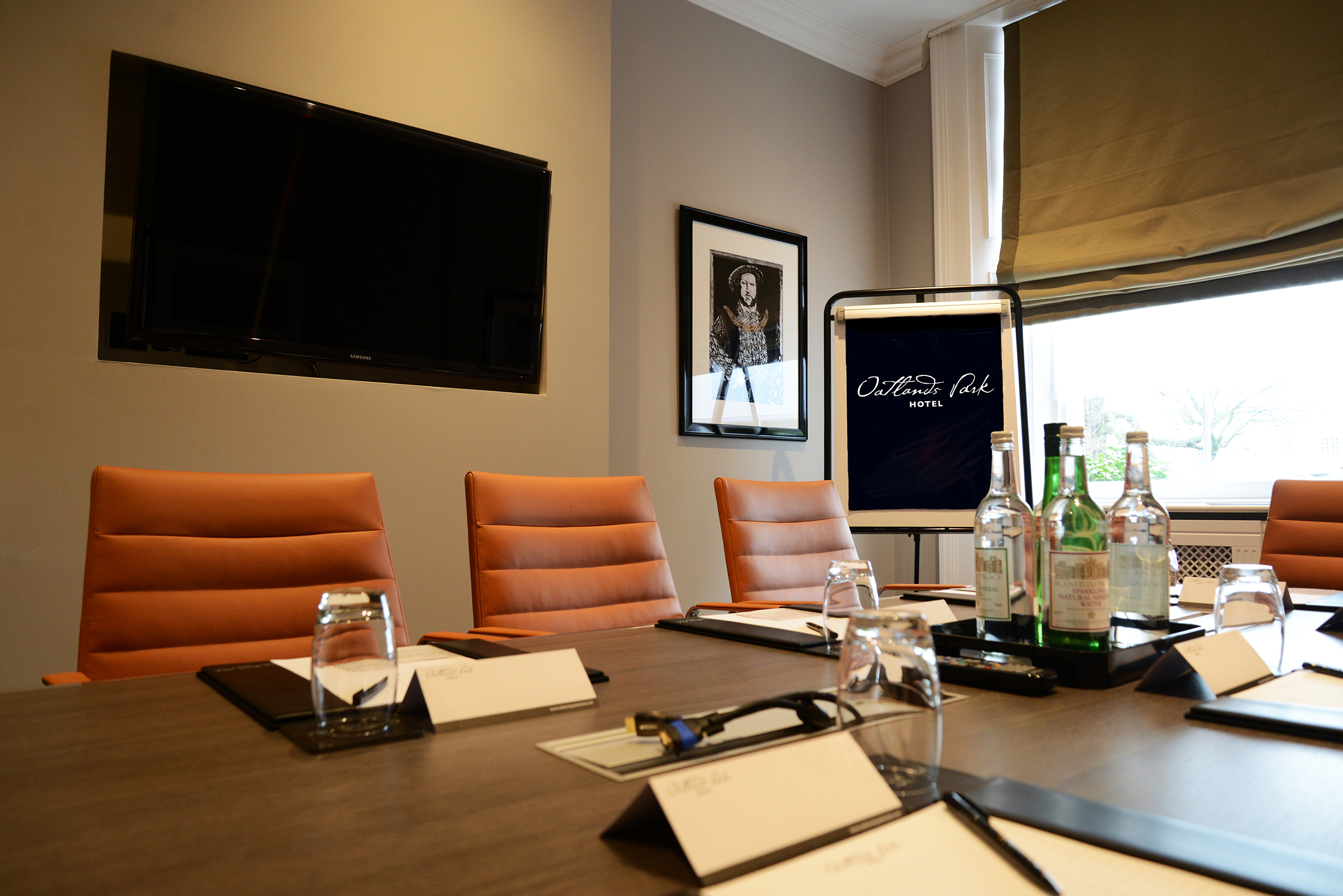 Howard Room at Oatlands Park Hotel, modern meeting space with sleek table setup.