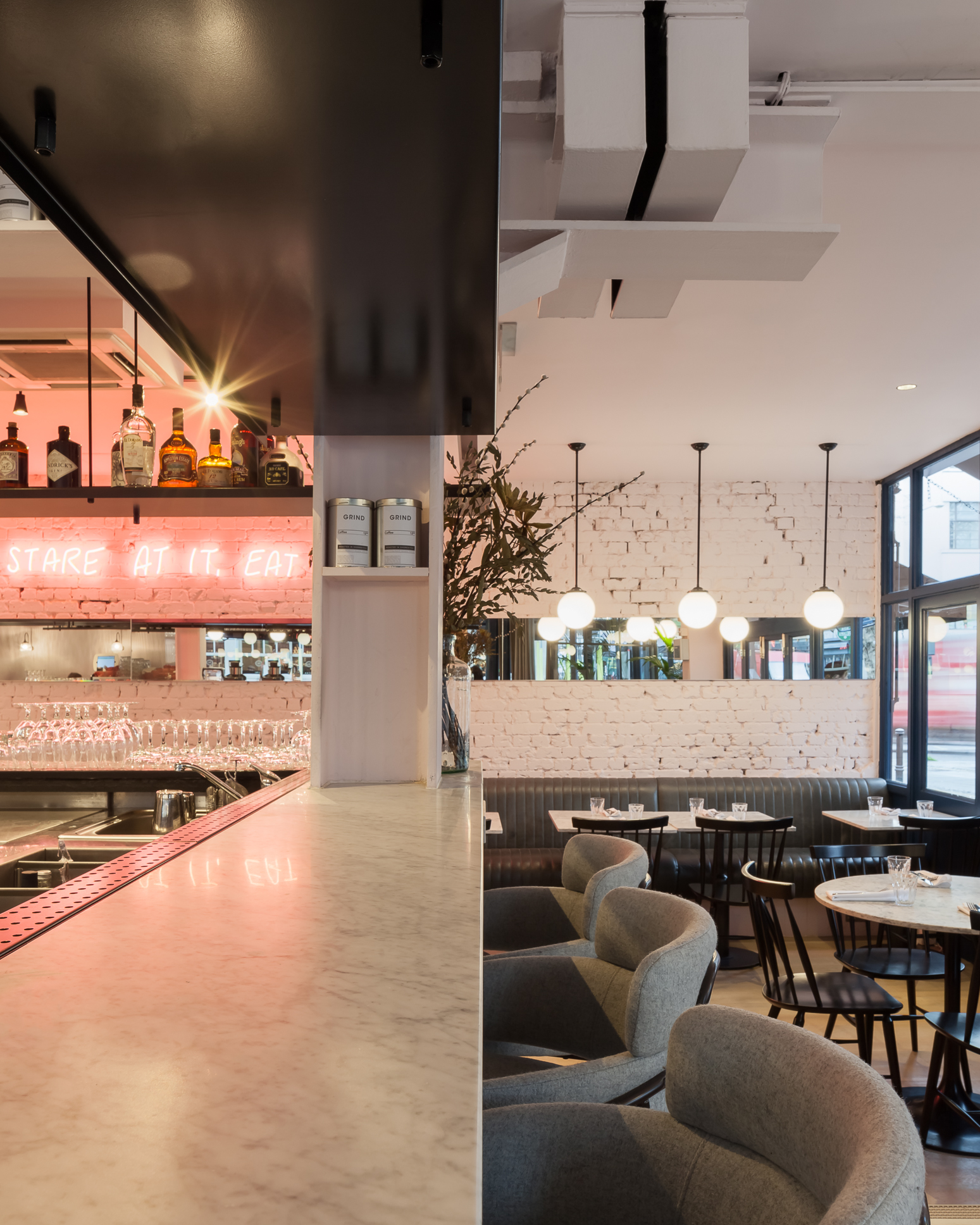 Chic venue in Exmouth Market with vibrant bar, ideal for events and gatherings.