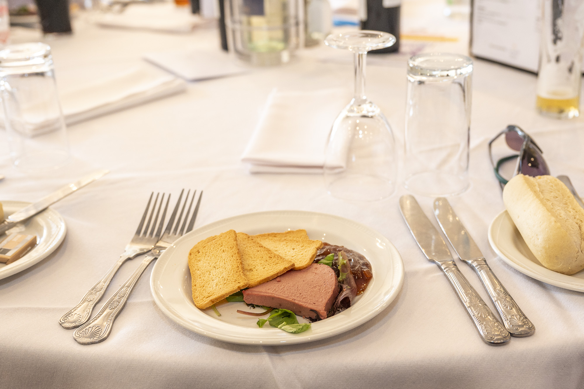 Elegant dining setup in Richmond Athletic Ground for networking event or meeting.