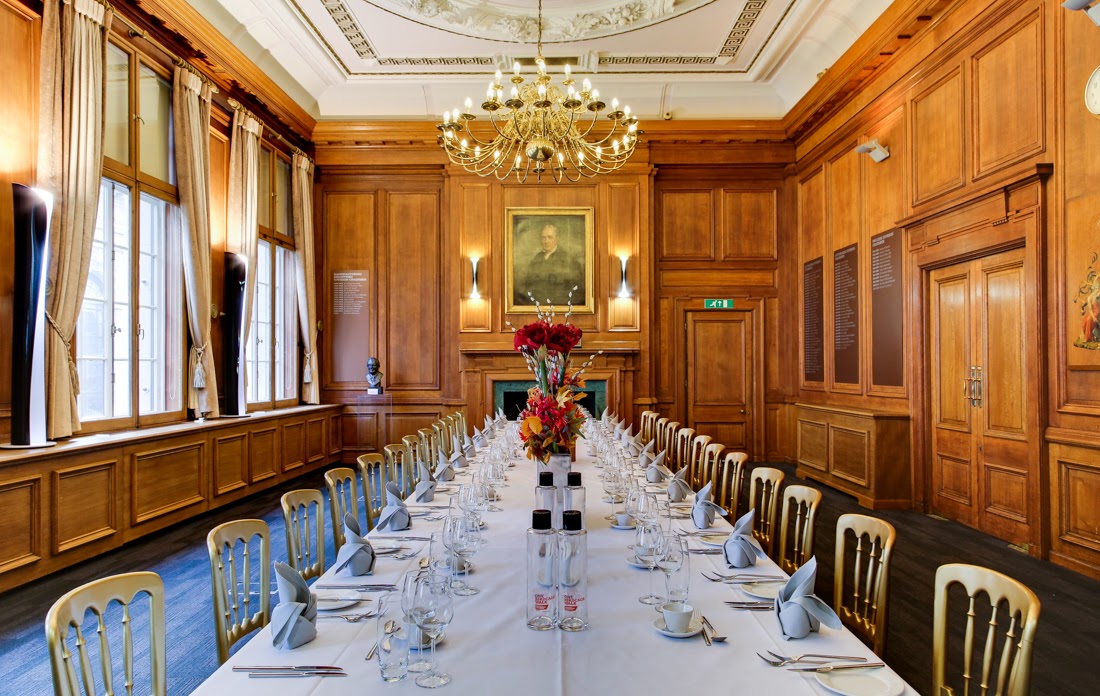 Elegant banquet table with floral centerpieces at Council in One Birdcage Walk for corporate events.