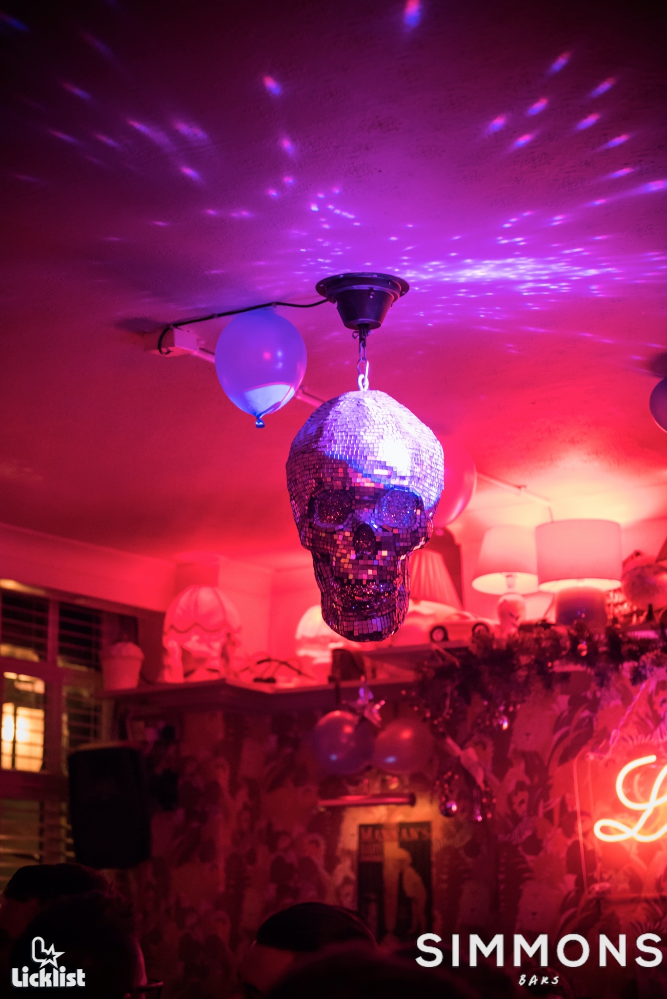 Skull disco ball in vibrant lighting at Simmons venue for themed parties and events.