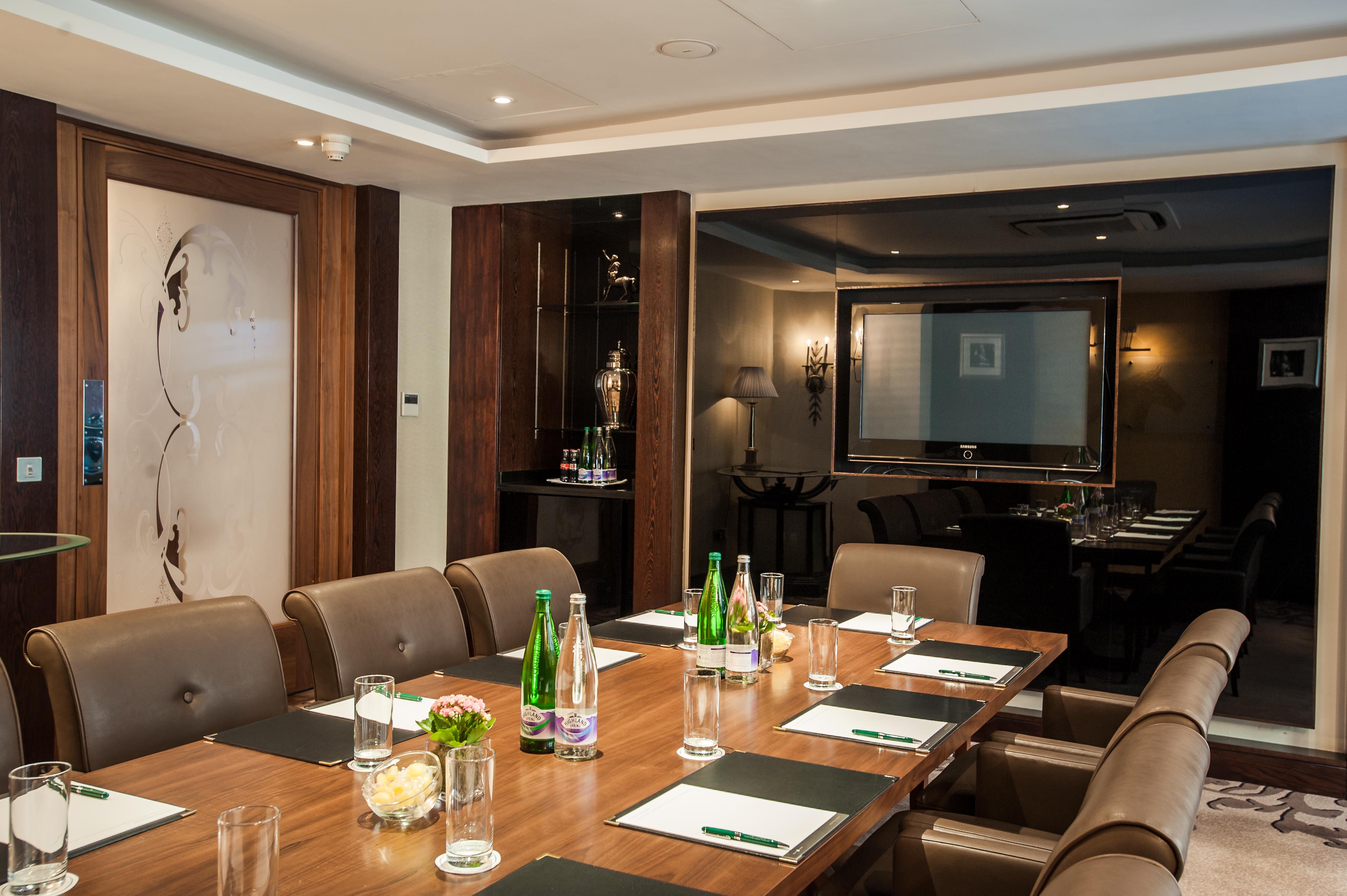 Executive Boardroom at The Royal Horseguards Hotel, ideal for meetings and presentations.