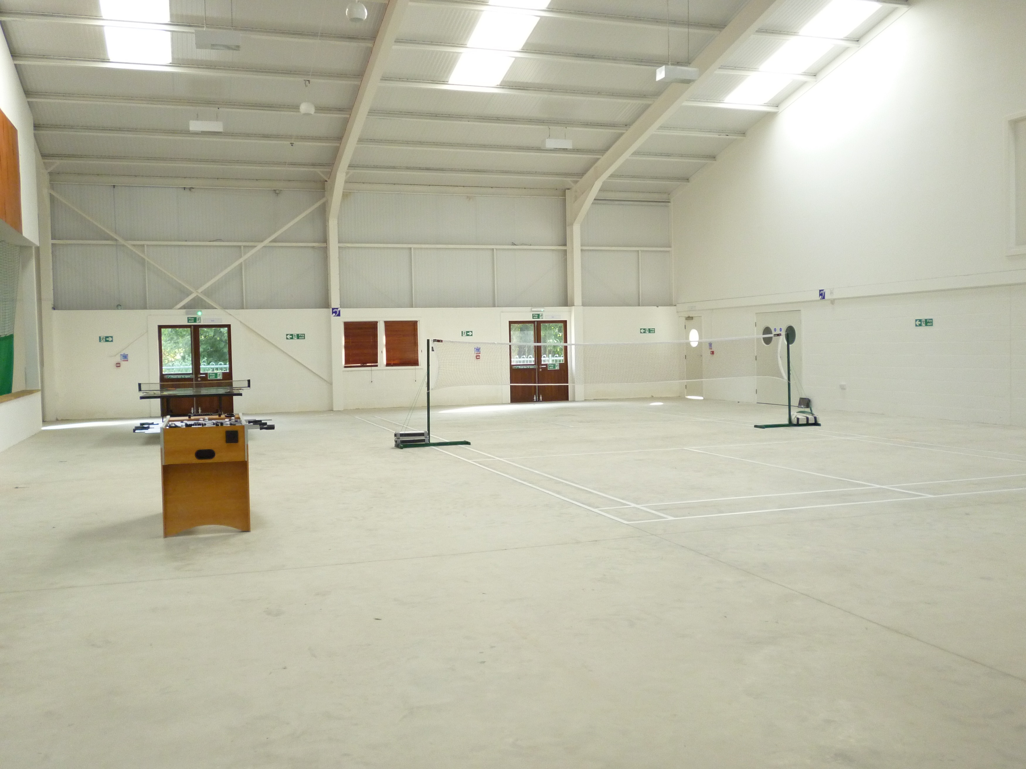 Spacious Sports Hall in Deanwood Barn, ideal for workshops and events with natural light.