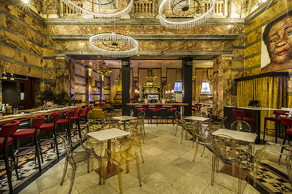 Elegant restaurant area with marble finishes, perfect for upscale events and receptions.