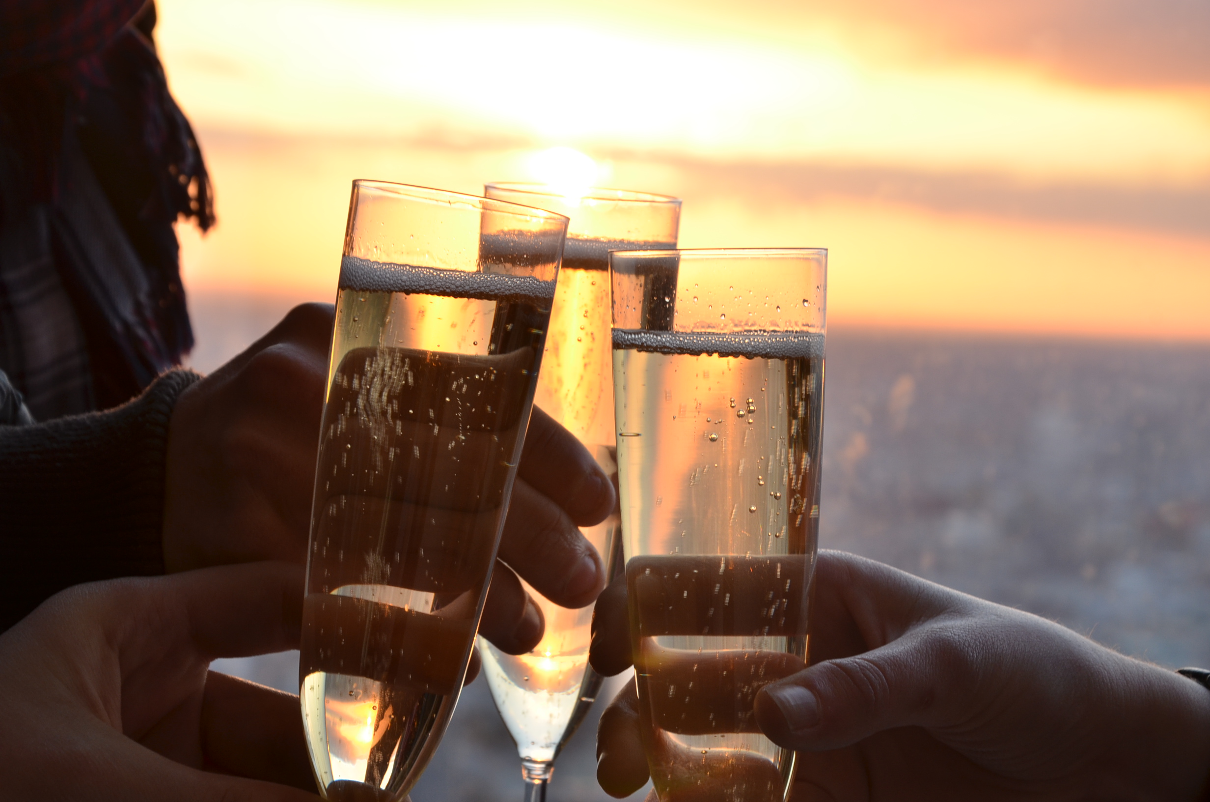 Champagne toast at sunset in The View From The Shard, perfect for events and celebrations.