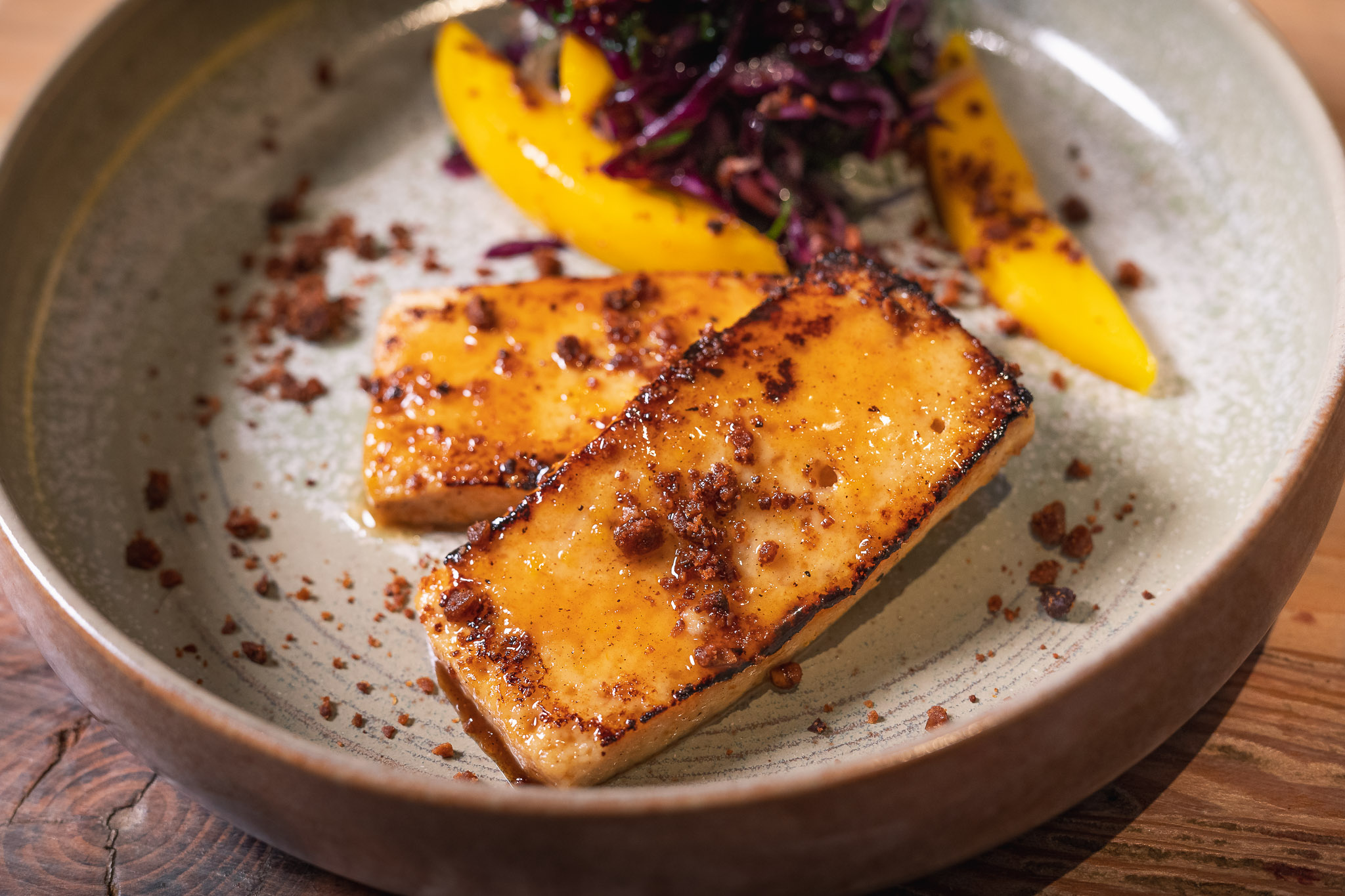 Caramelized tofu dish with mango at Wild Heart Bar, Soho event catering.