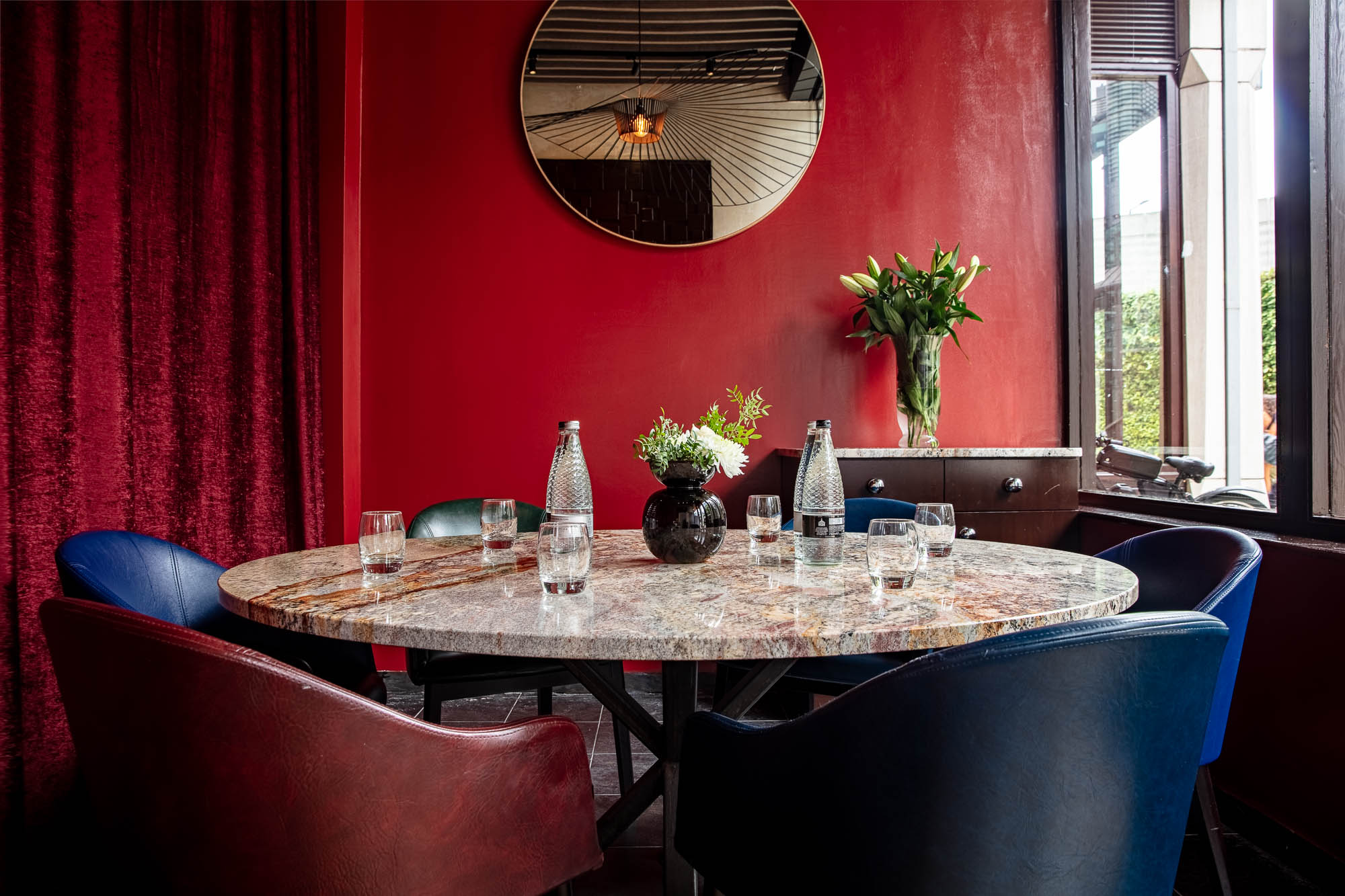 Stylish meeting space with marble table at Exclusive Venue Hire, perfect for gatherings.