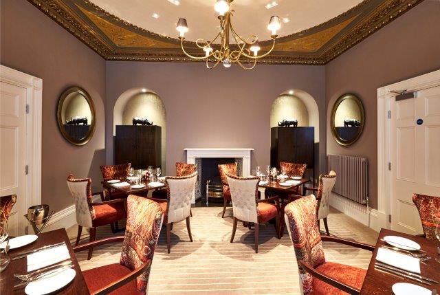 Elegant dining space in De Lys Room, ideal for intimate meetings and corporate events.