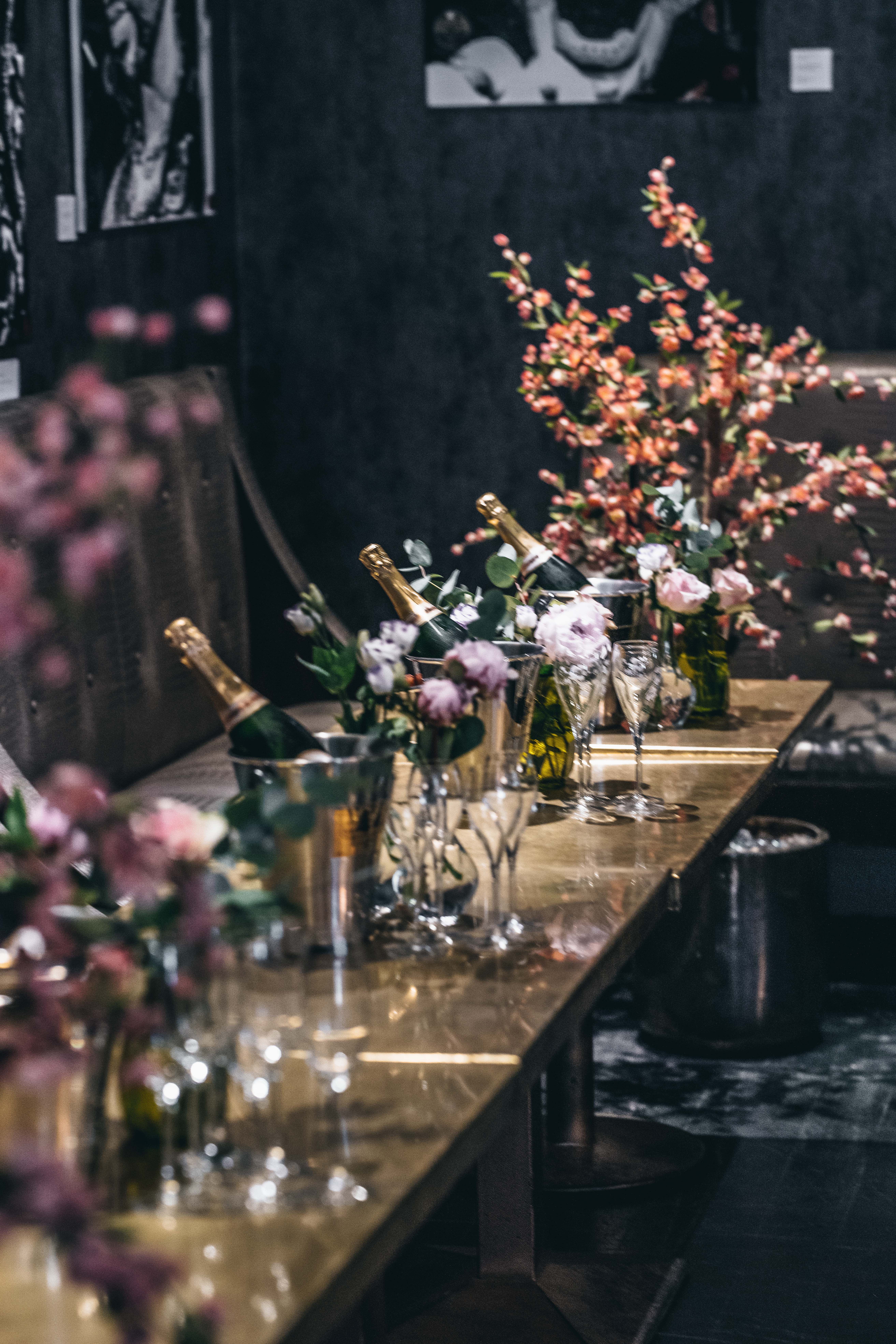 Elegant table setting with champagne at Karma Sanctum Soho for events and celebrations.