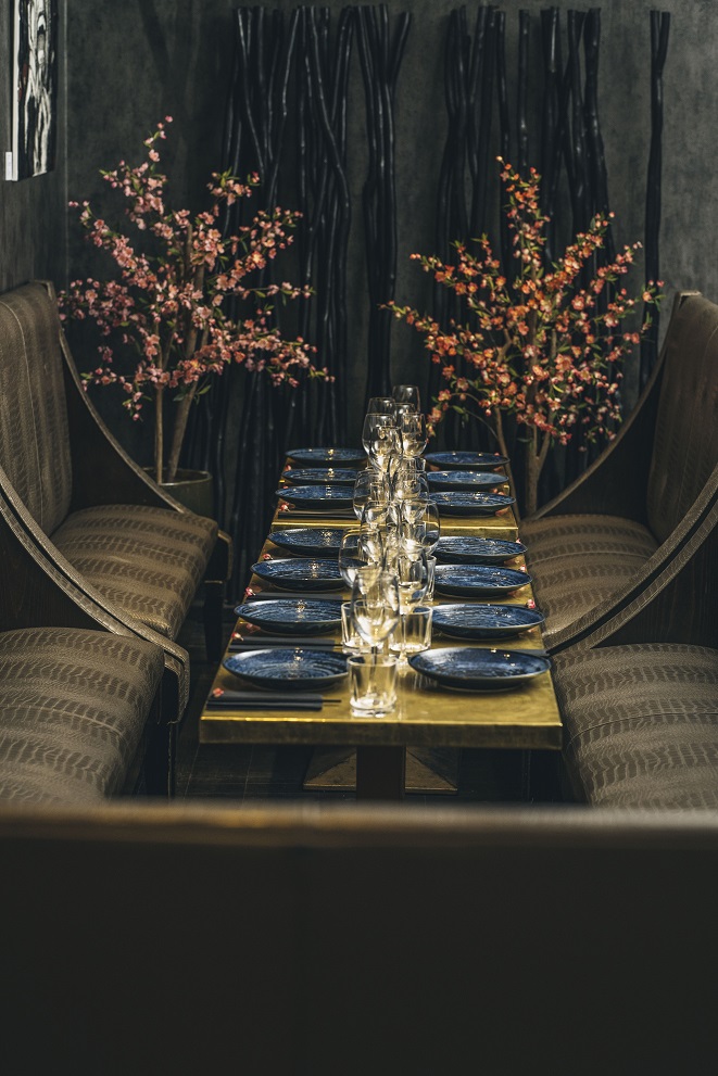 Elegant dining table in The Inner Sanctum, perfect for sophisticated events and gatherings.