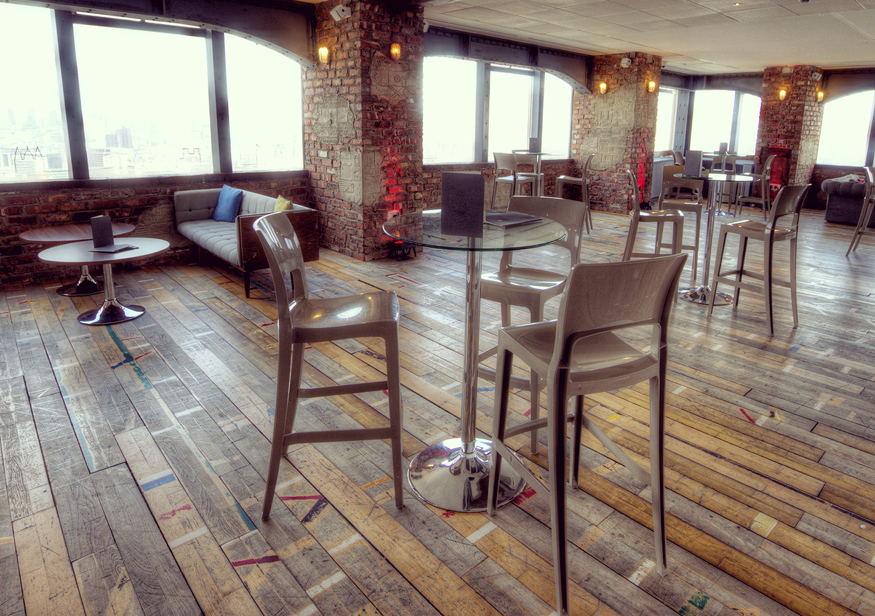 Stylish event space at Skyloft with natural light, perfect for networking and gatherings.