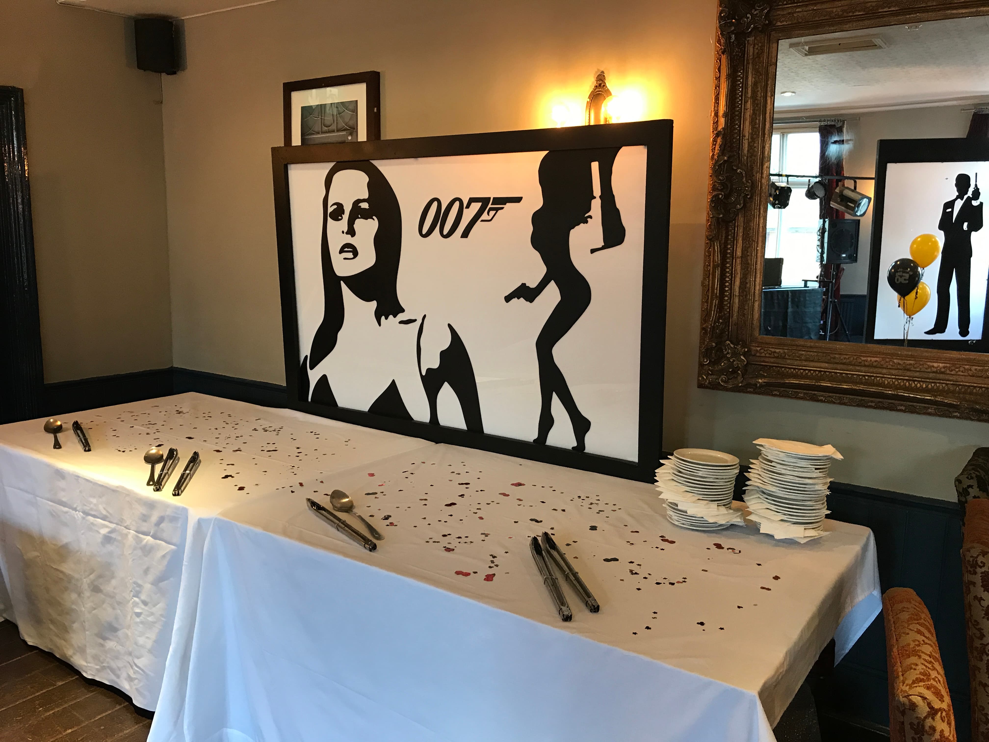 James Bond themed buffet setup in The Windsor Room, Crown Hotel for corporate event venue.