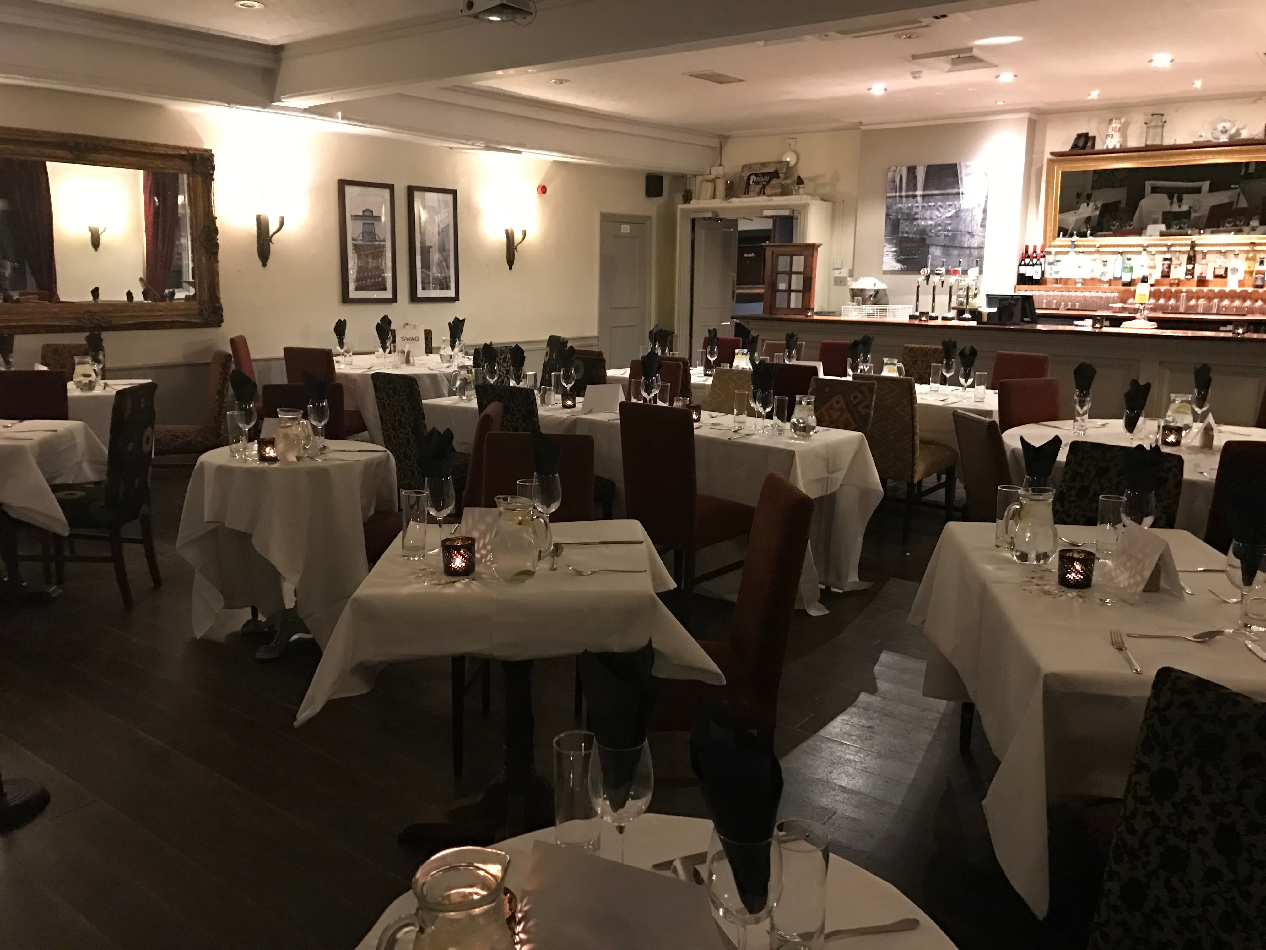 Windsor Room at The Crown Hotel with formal table settings for private dining and social events.