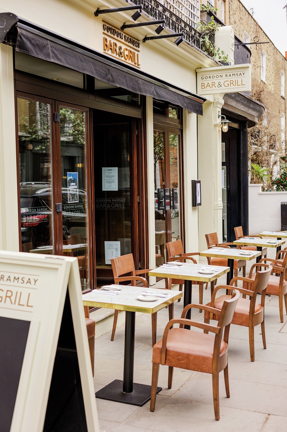 Outdoor dining area at Gordon Ramsay Bar and Grill, perfect for networking events.