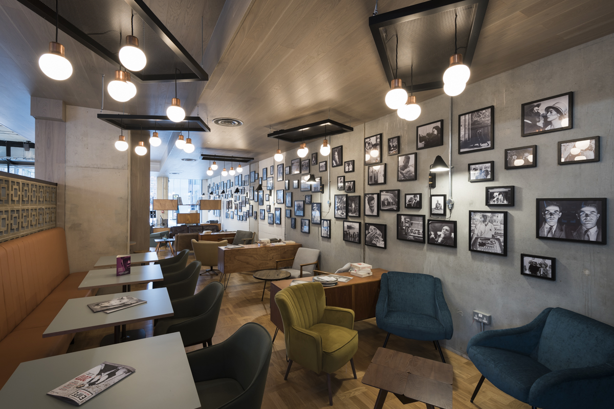 Curzon Aldgate café space with cozy lighting, ideal for networking and meetings.