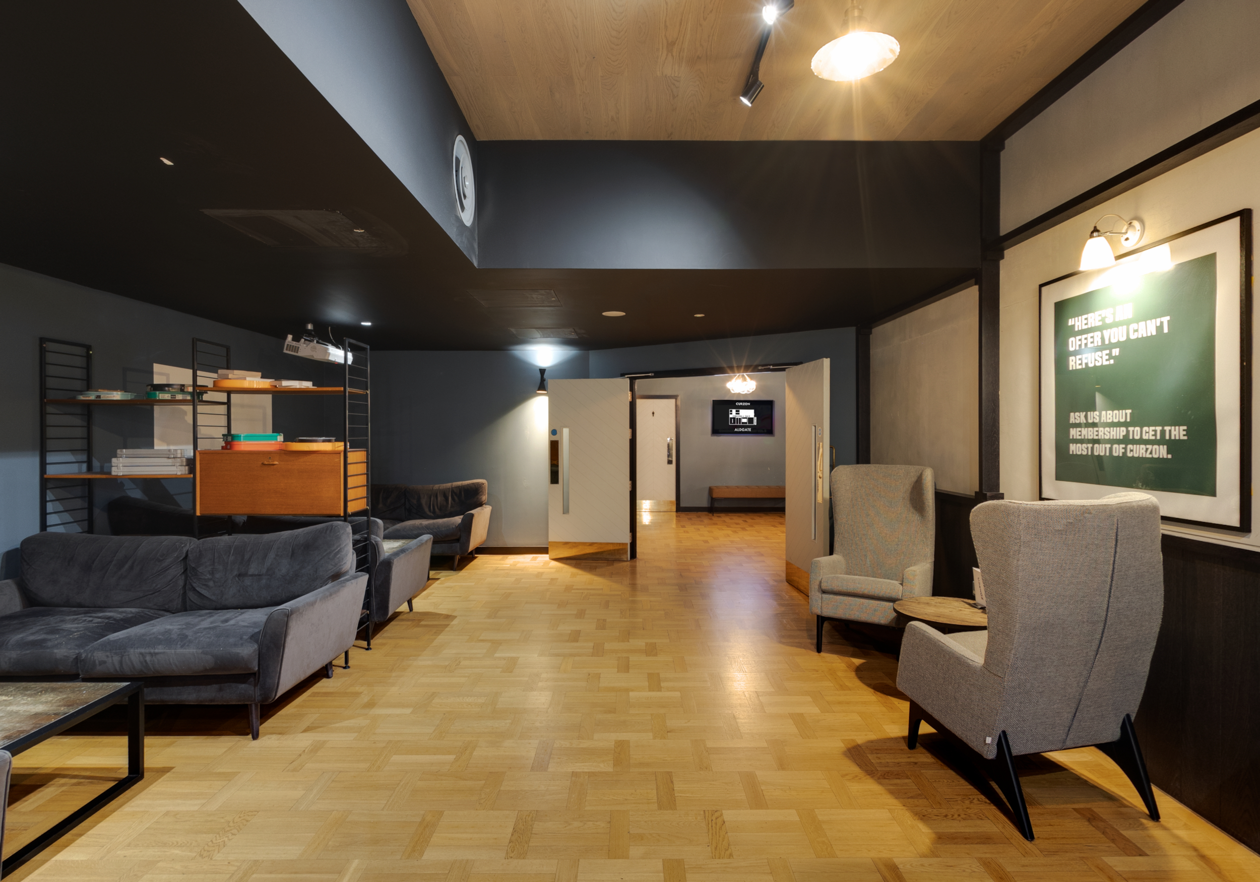 Curzon Aldgate bar area with modern seating for networking events and informal meetings.