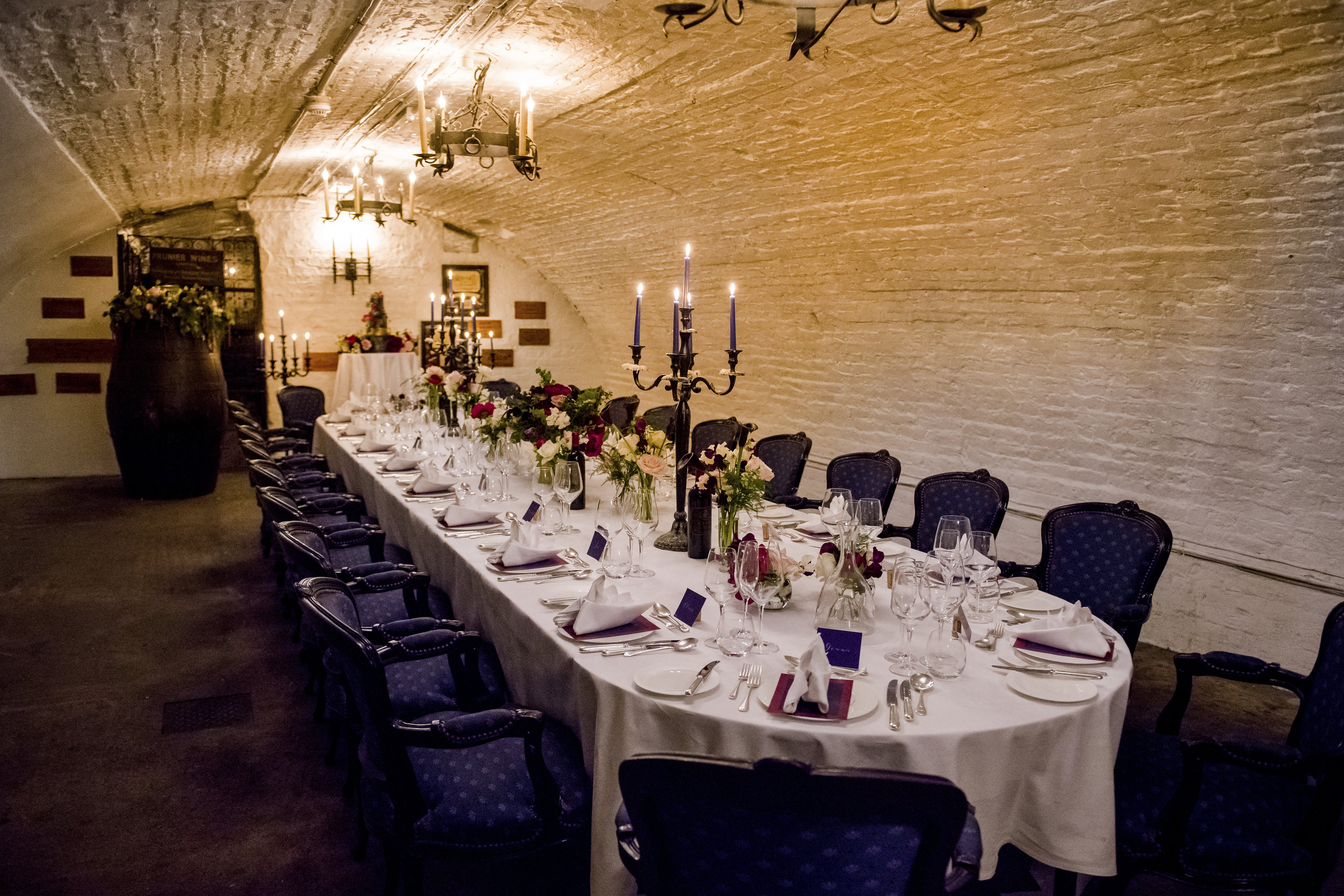 Elegant dining table in The Wine Cellars, perfect for intimate gatherings and corporate dinners.
