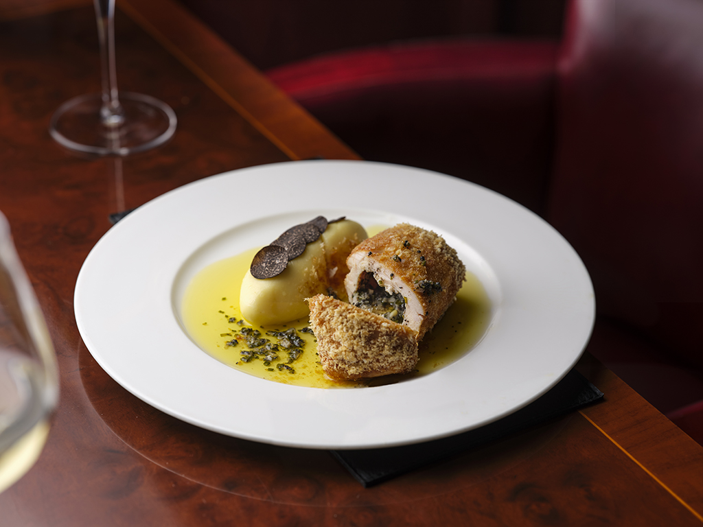 Gourmet dish with crispy protein and truffle at The Wine Cellars, Stafford London event.