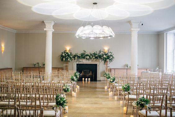 Elegant wedding venue, floral decor, candlelit ceremony
