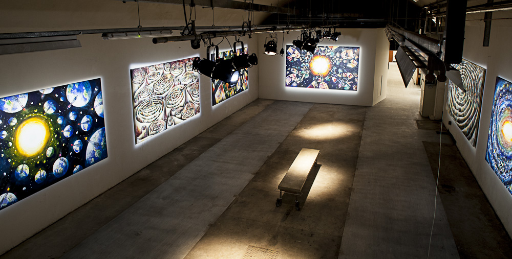 Spacious gallery with vibrant art, perfect for exhibitions and corporate events.