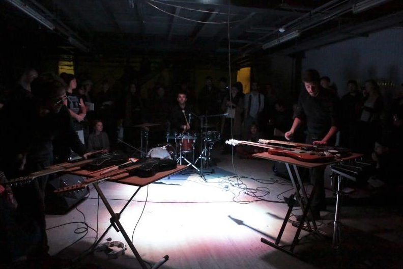 The Mezzy One performing live in low-lit Vaults, ideal for intimate events and showcases.