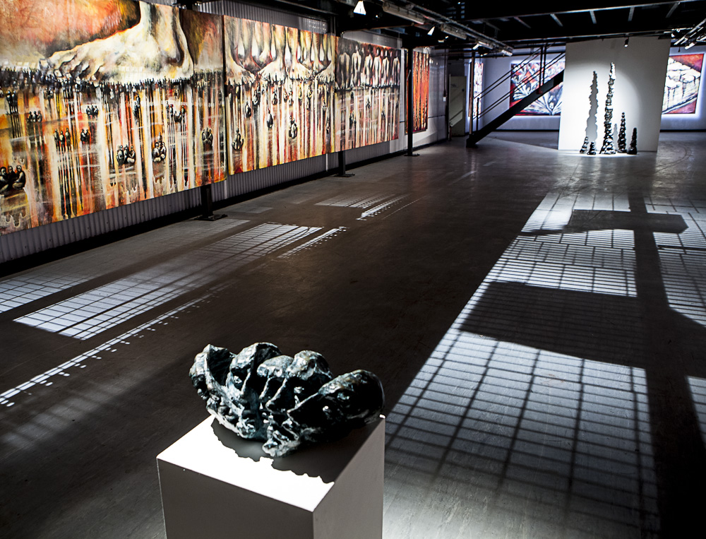 Modern gallery venue with striking artwork for art exhibitions and corporate events.