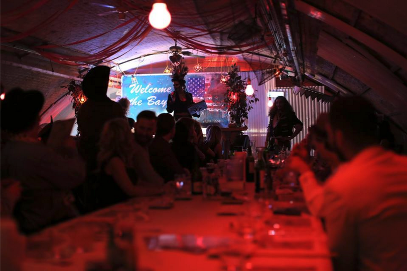 Vibrant event space in The Vaults, perfect for intimate dinners and networking events.