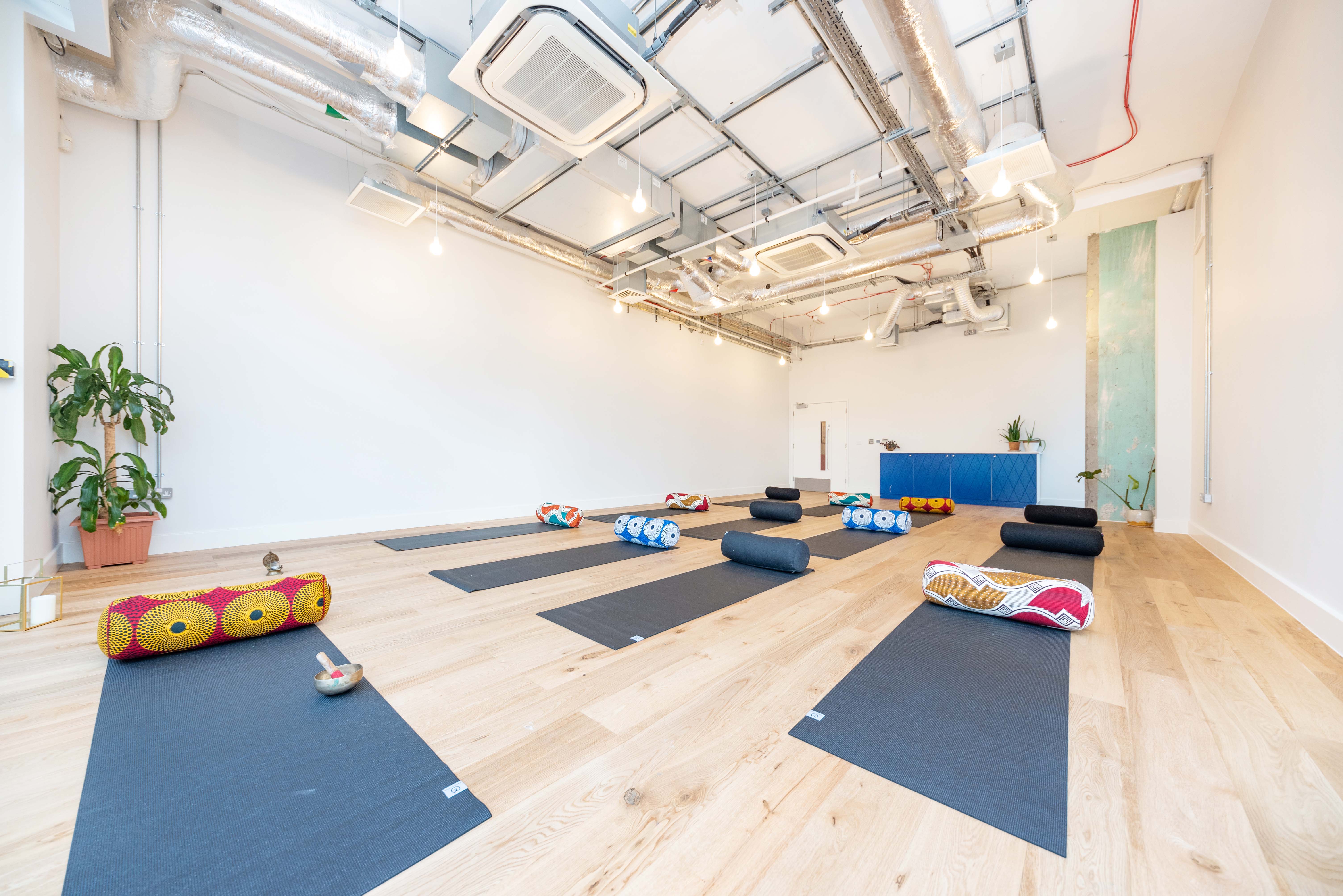 Meeting Room at The Arc Centre, Islington with yoga mats for wellness retreats and workshops.