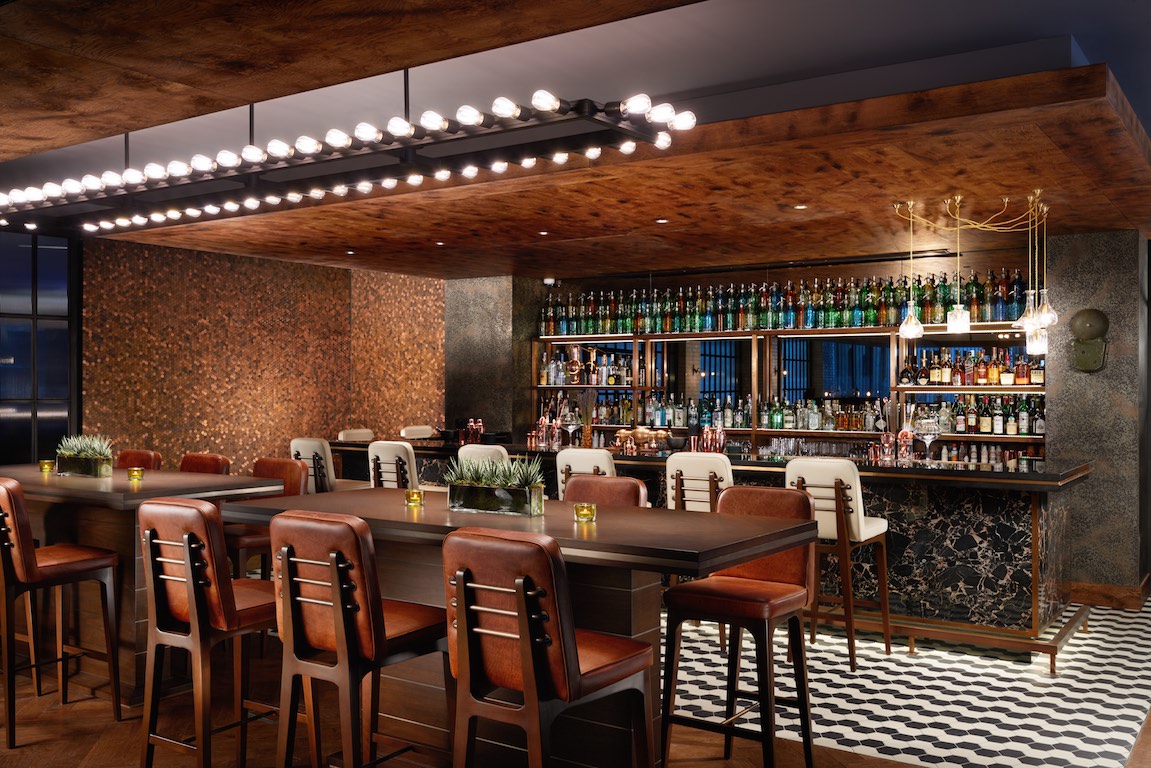 Stylish Distillery Bar in Hilton London Bankside, ideal for networking and cocktail receptions.