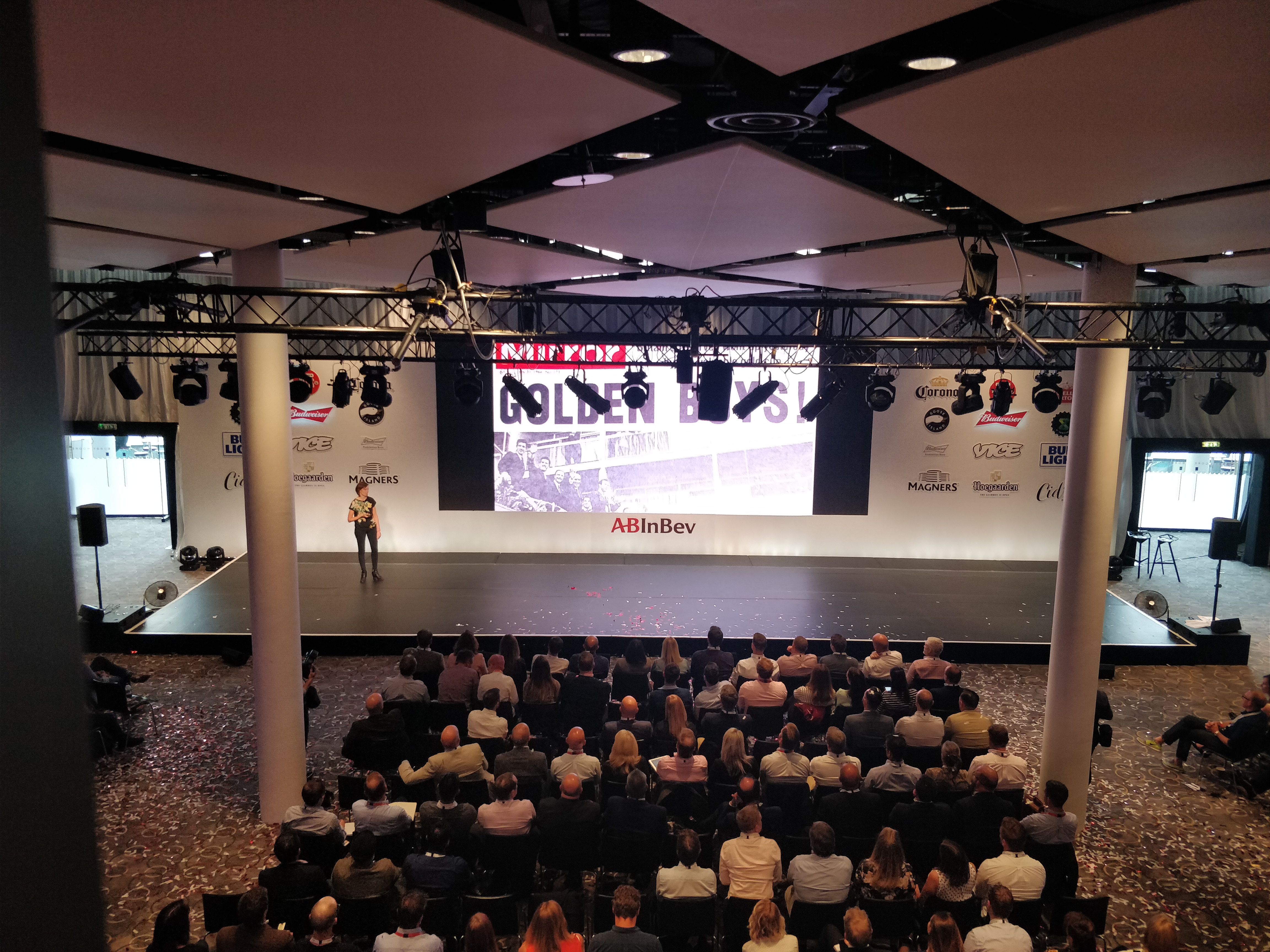 Bobby Moore Room at Wembley Stadium, featuring a speaker and engaged audience for conferences.