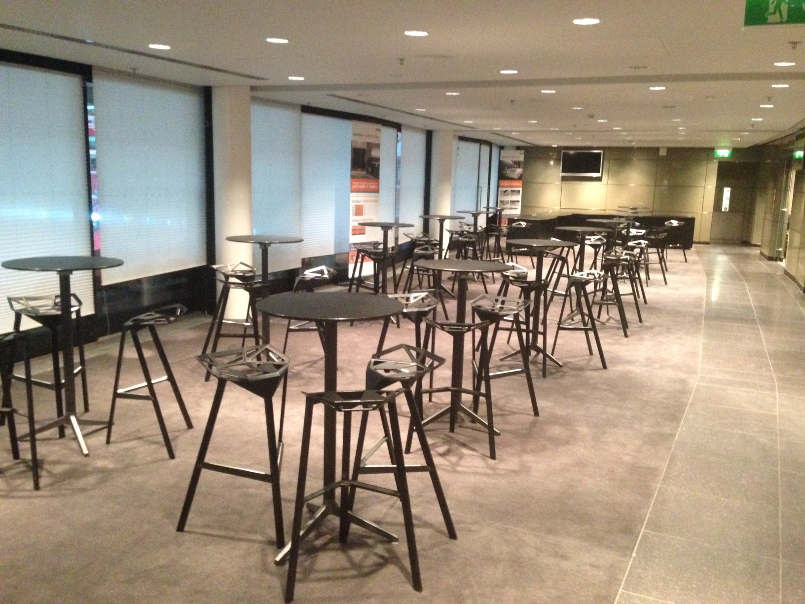 Pitch View Room at Wembley Stadium, spacious venue with high-top tables for networking events.
