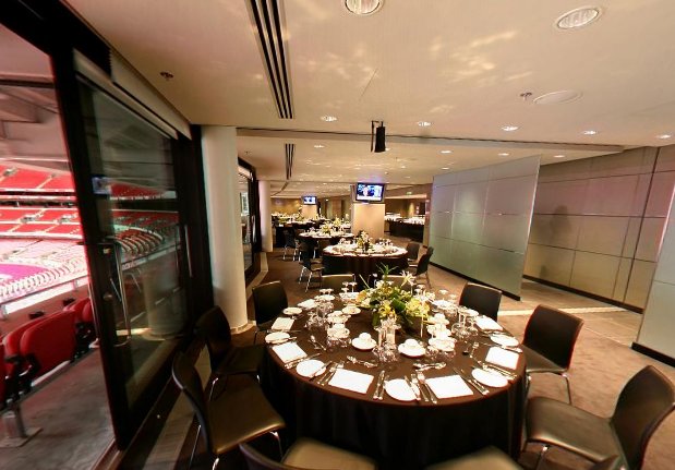 Pitch View Room at Wembley Stadium, elegant dining setup for corporate events and celebrations.