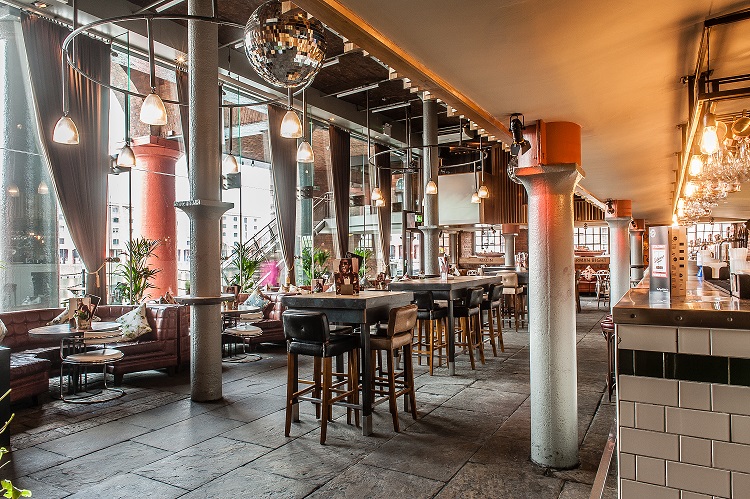 Stylish venue with modern layout for events at Revolution Albert Dock, ideal for gatherings.