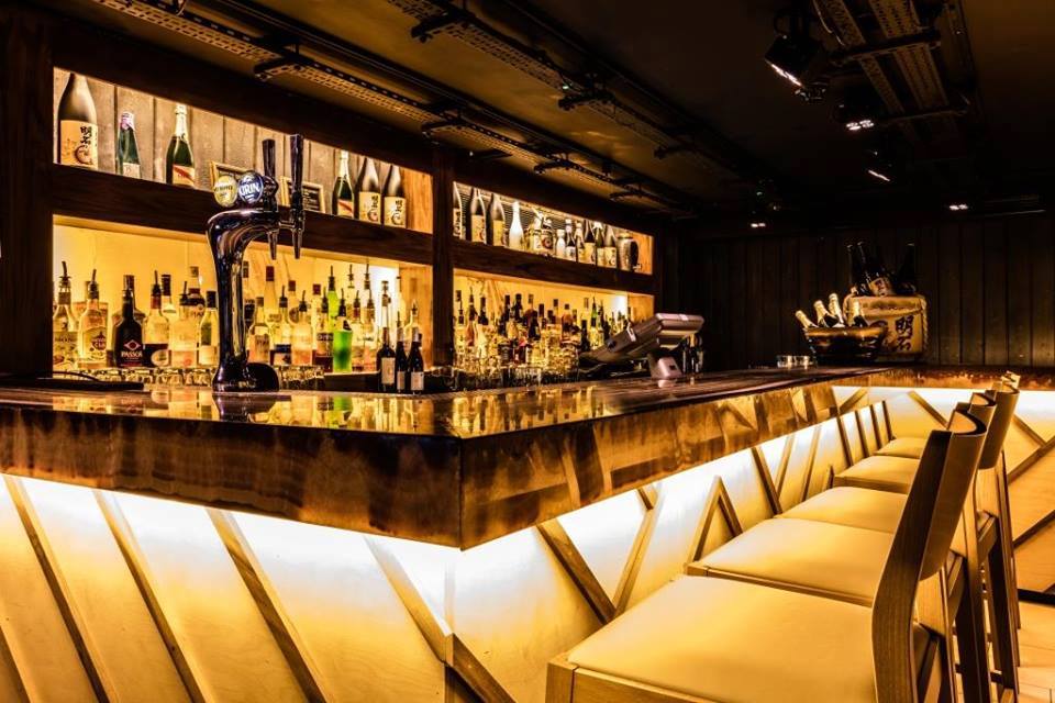 Sleek Onyx Bar in Inamo Covent Garden, ideal for networking and cocktail receptions.