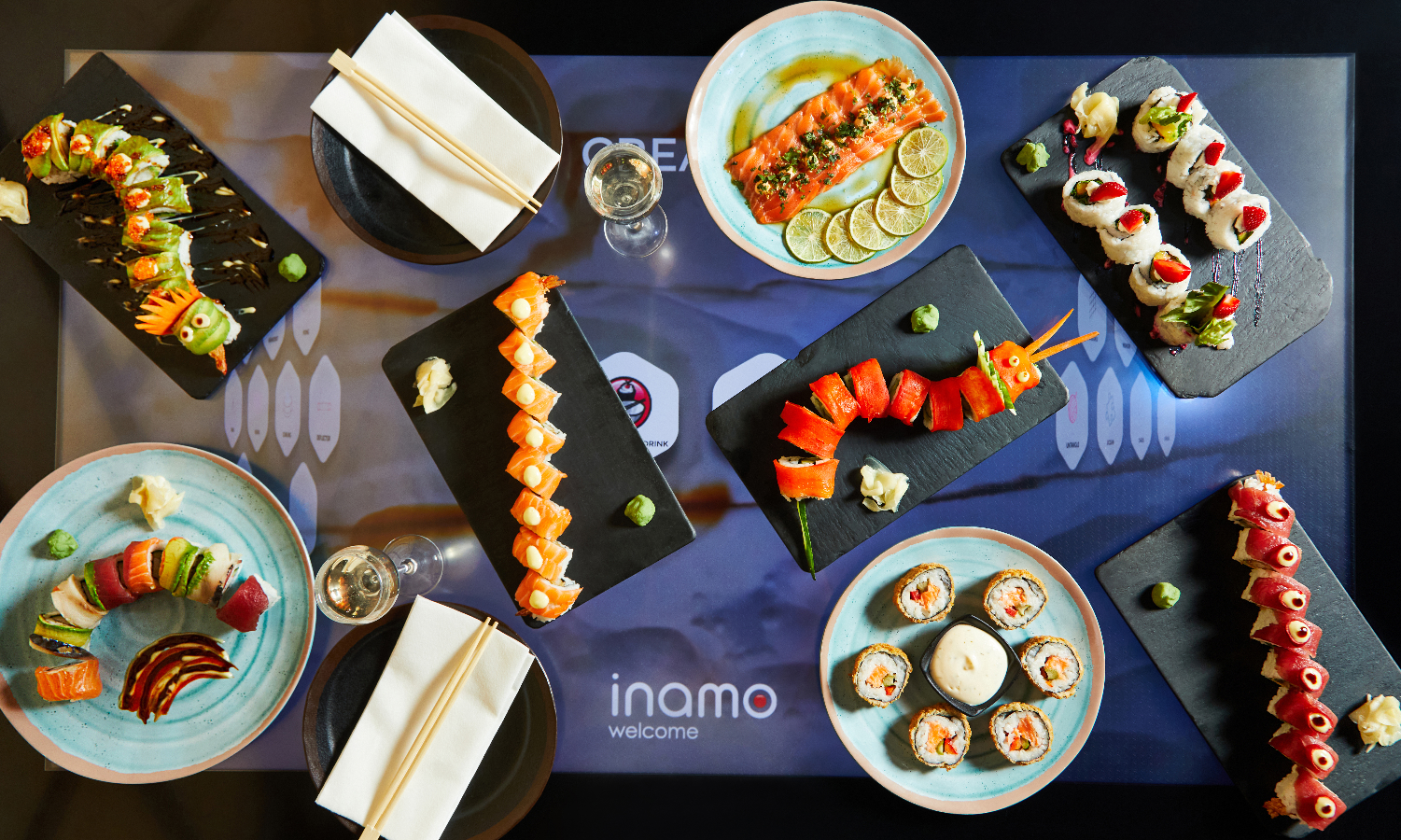 Vibrant sushi spread at Inamo Covent Garden for corporate dinner or networking event.