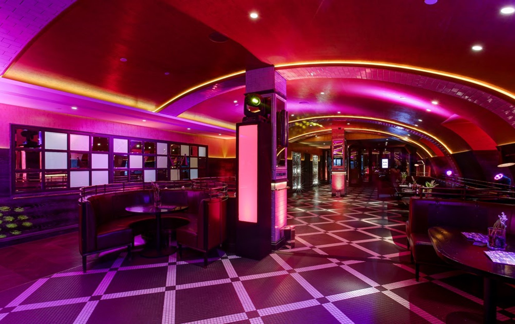 Vibrant Aqua Nueva venue with dynamic lighting for lively gatherings and parties.