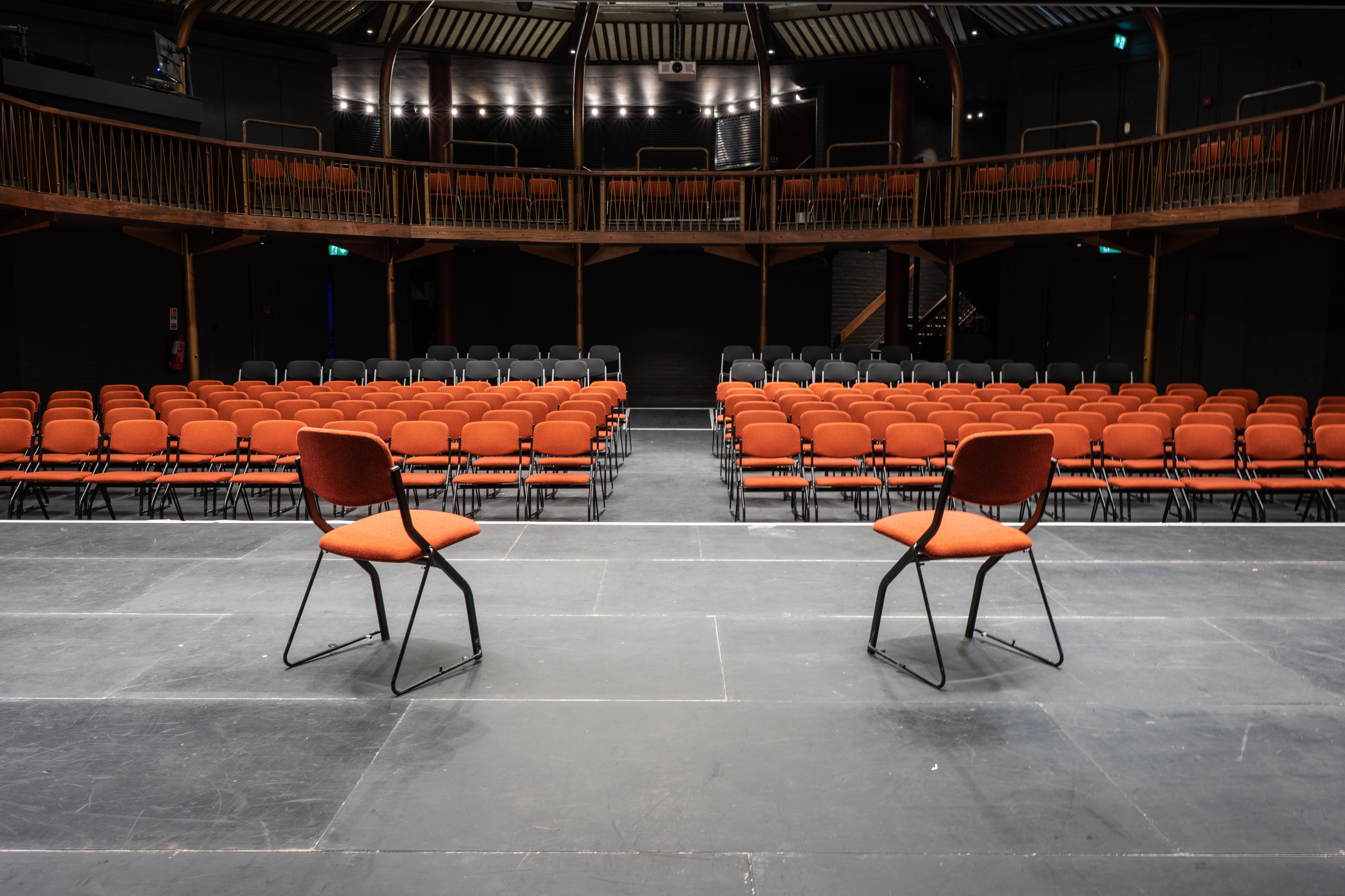 Theatre in The Albany: versatile event space with stage for engaging discussions and performances.