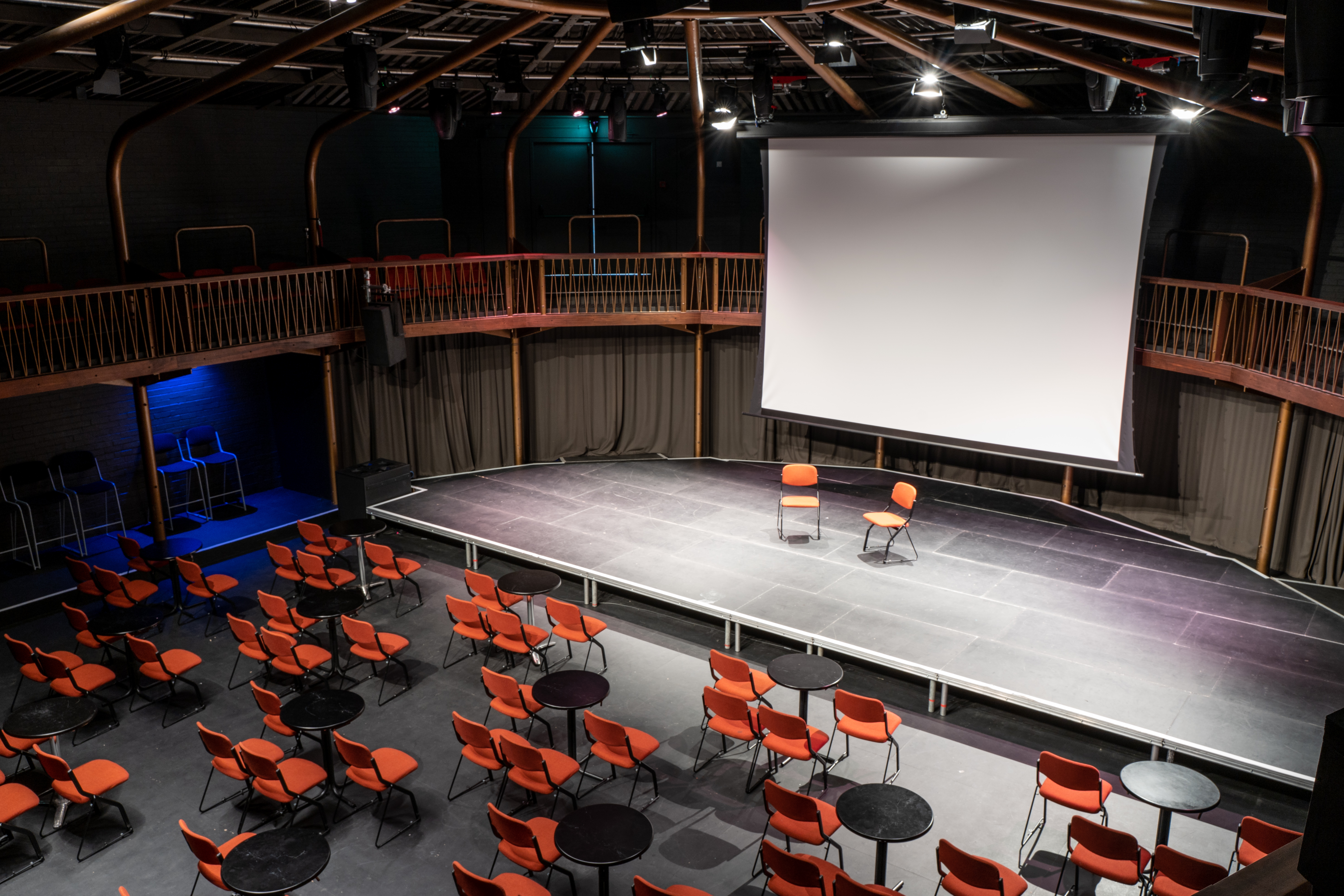 Theatre in The Albany: versatile event space with elevated stage for presentations and discussions.