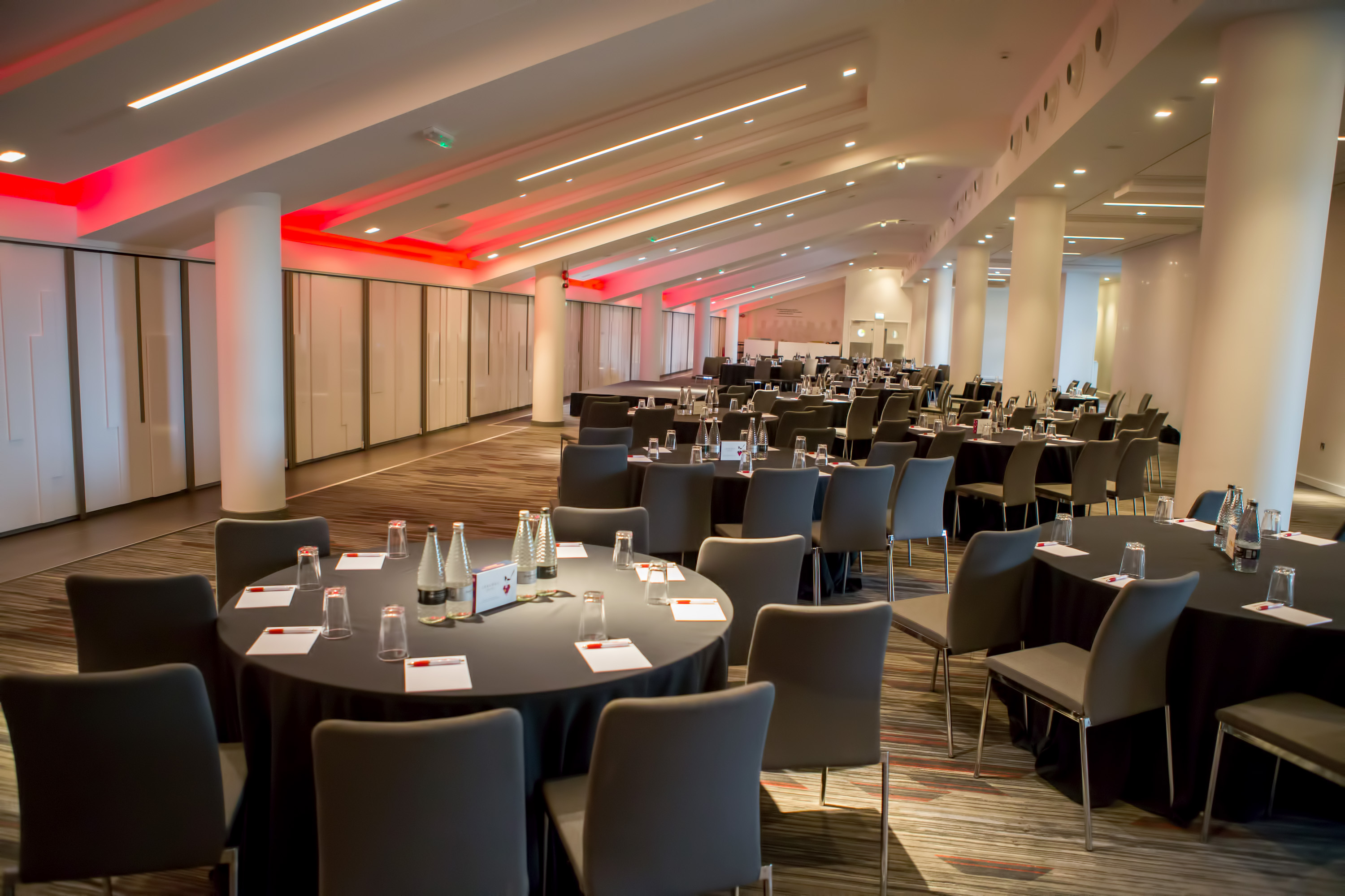 Spirit of Rugby at Twickenham: modern conference space with round tables, ideal for corporate events.