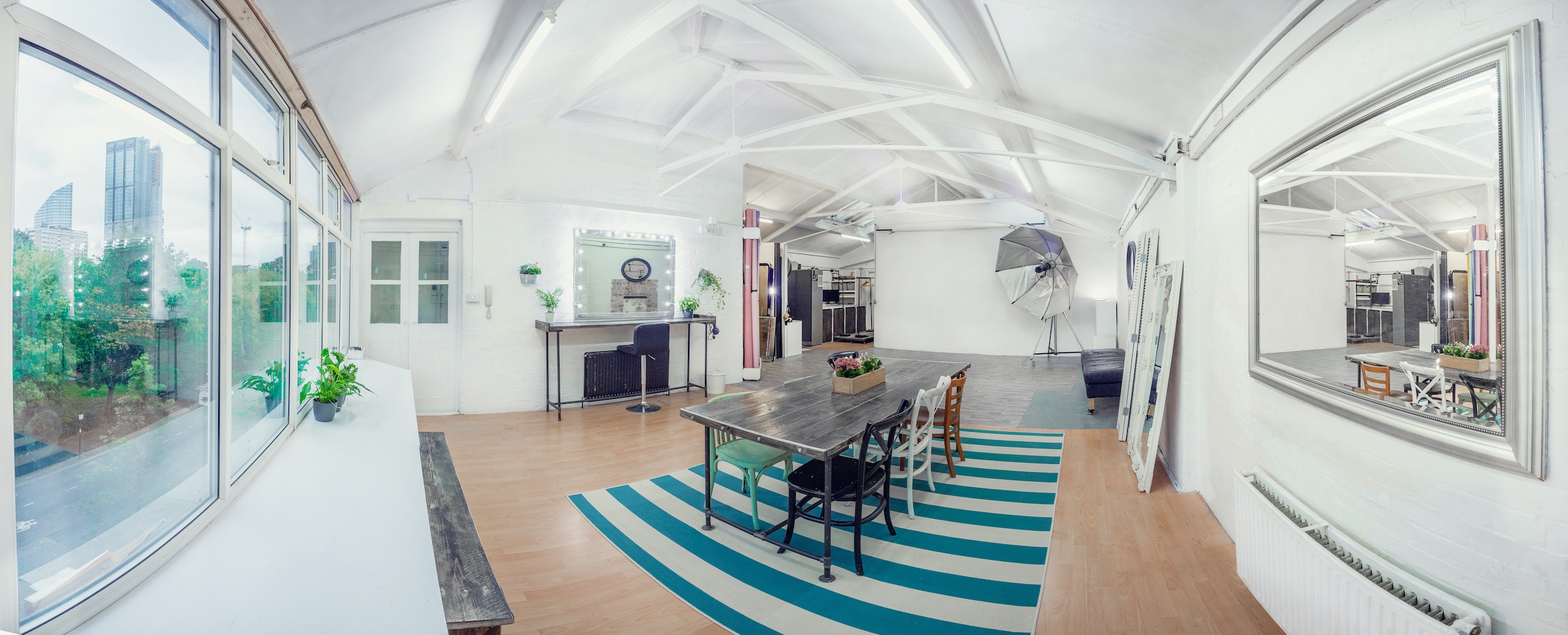 Versatile event space in Poutstudios with modern decor, ideal for meetings and workshops.