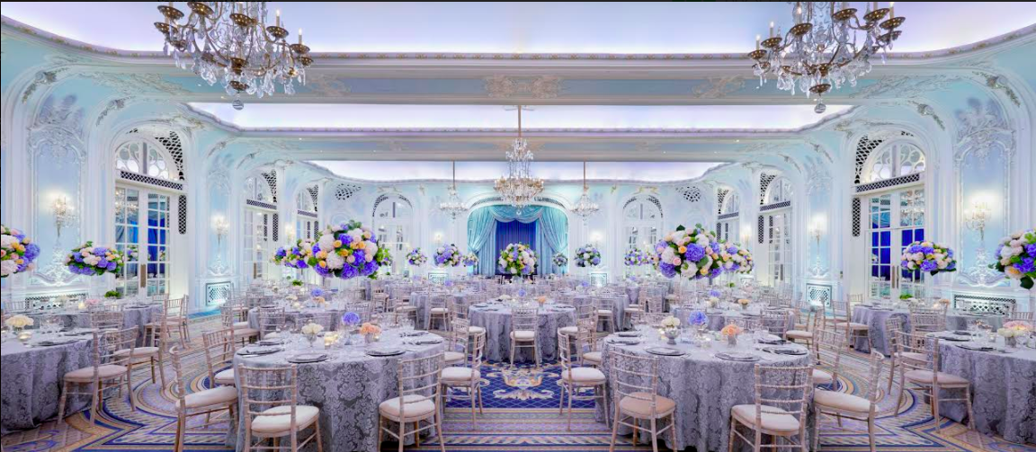 Elegant Lancaster Ballroom with round tables, ideal for formal events and gatherings.